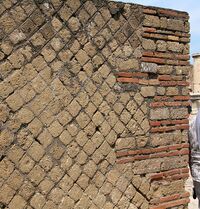 opus reticulatum en un muro de Pompeya