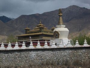 Entering the impressive Samye Monastery through its protective wall.jpg